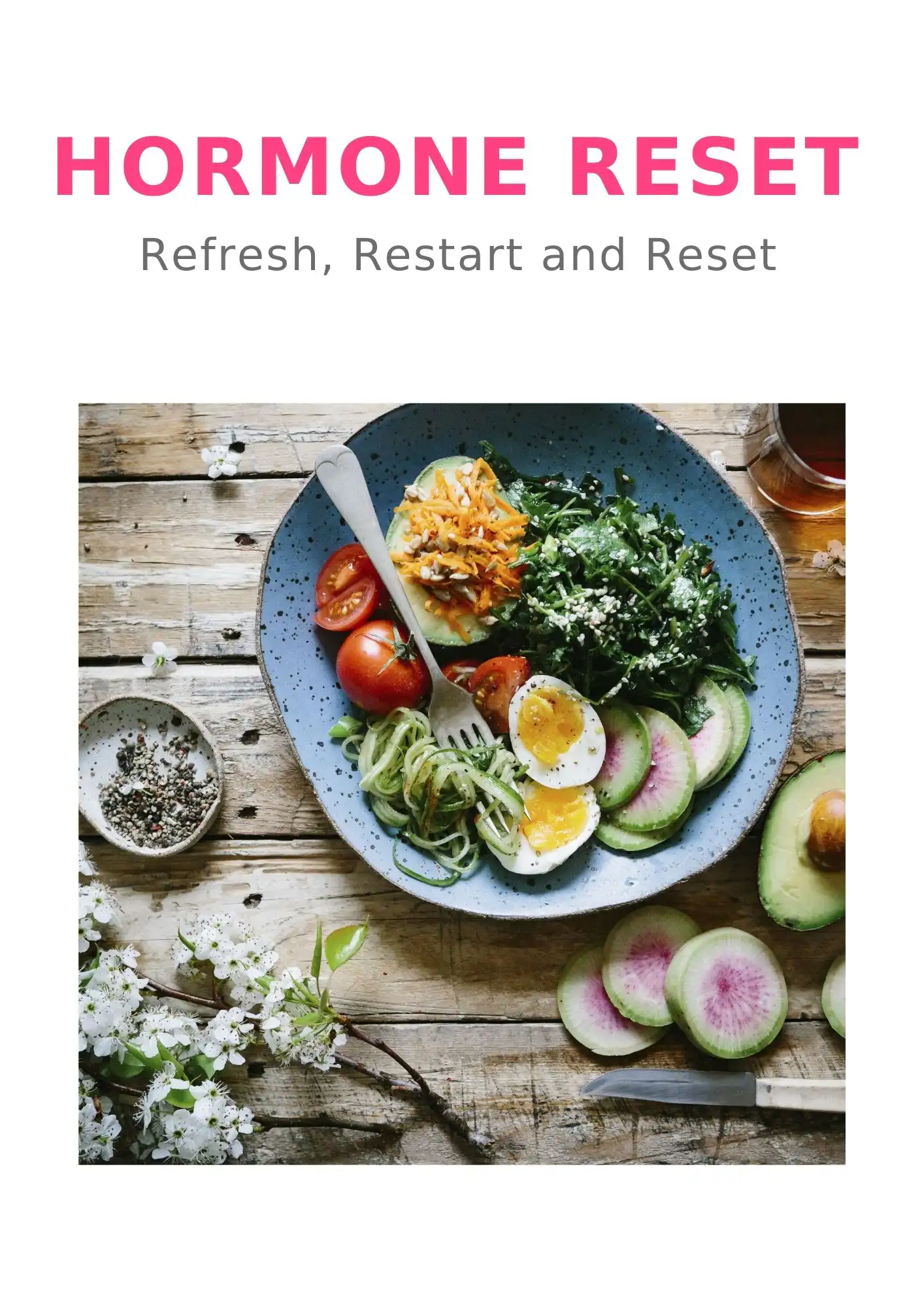 Healthy colorful salad with eggs, tomatoes, and greens for hormone health.